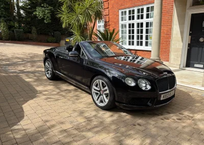2013 BENTLEY CONTINENTAL GT V8 CONVERTIBLE. ONYX with BLACK HIDE INTERIOR.